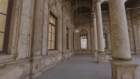 courtyard of mosque of sultan hassan, cairo, egypt.  camera moves between columns inside the mosque