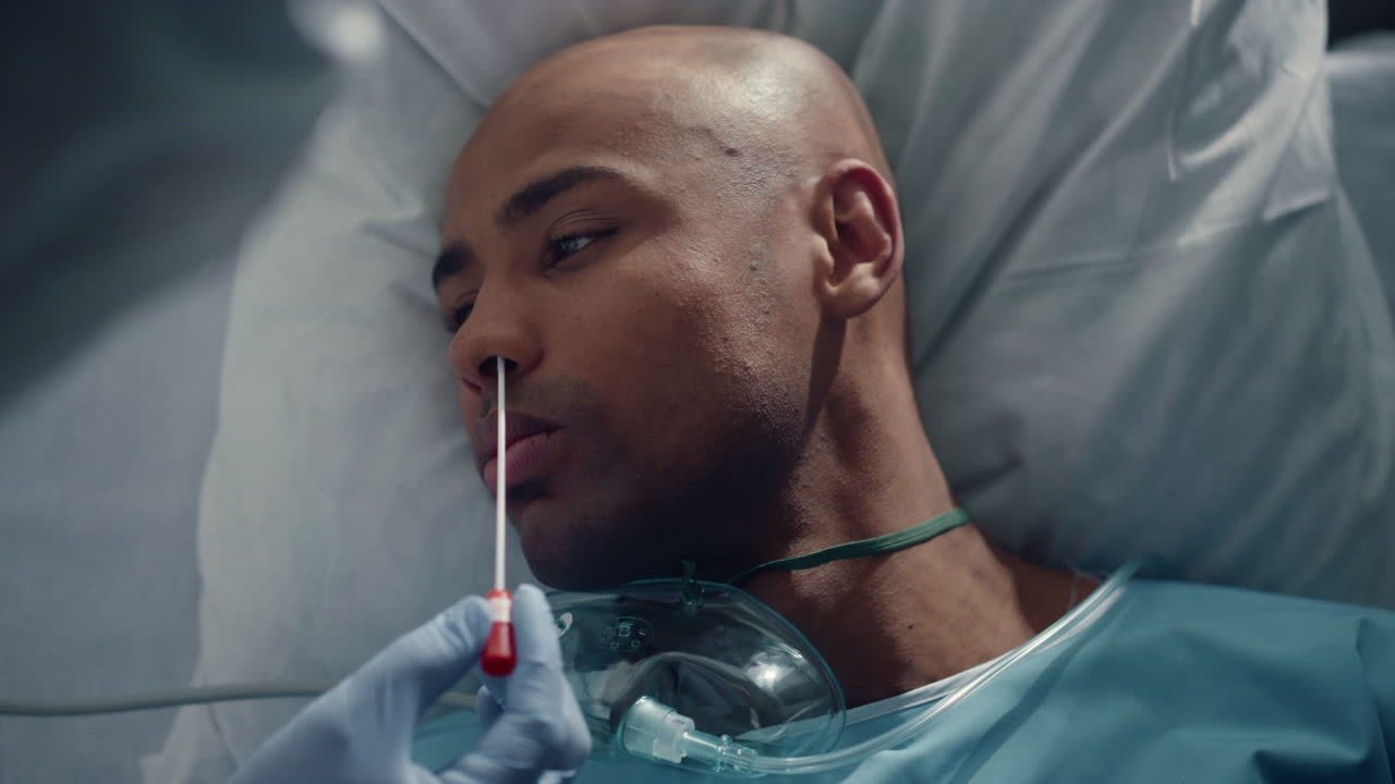 Patient getting swab testing for covid19 in hospital emergency unit closeup.
