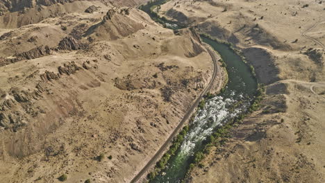 deschutes river oregon aerial v75 high angle birds eye view, flyover deschutes river white horse rapids capturing canyon rock formation and winding river bend - shot with mavic 3 cine - august 2022