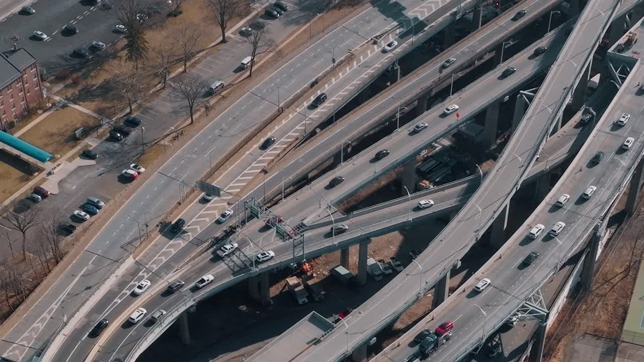 Traffic flows on a busy highway in New York City during the day