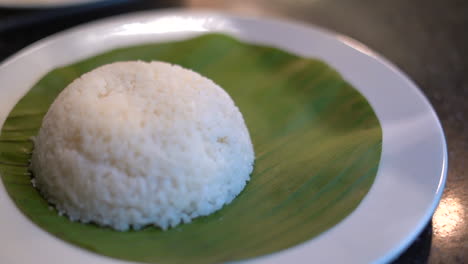 bowel of rice plating on banana leaf eggs and curry dish south indian food