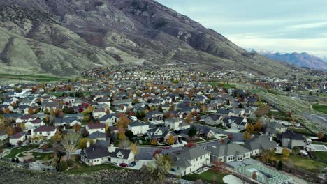 residential city streets in utah county by wasatch mountains - aerial