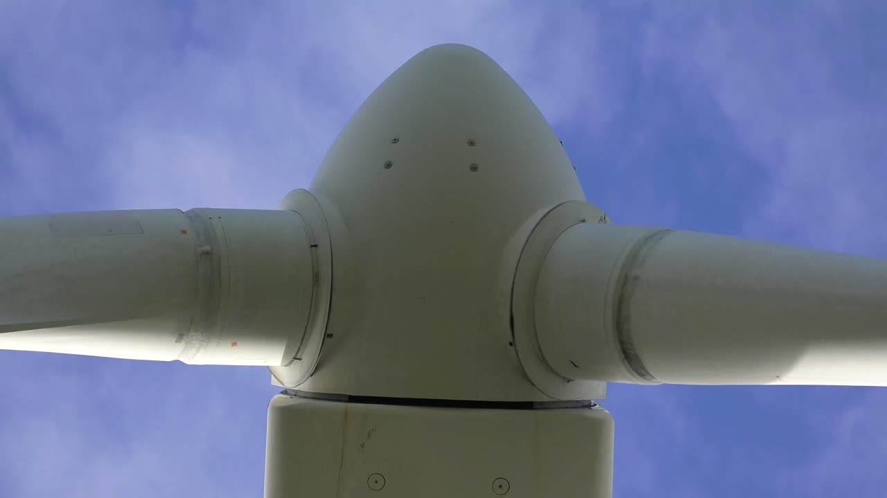 A wind turbine is a device that converts the wind's kinetic energy into electrical energy.