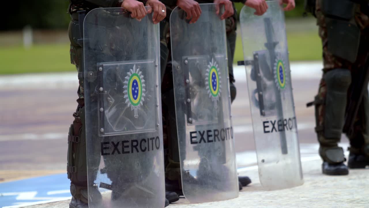 Unity we stand, as one we wield, trouble strikes, we raise our shield