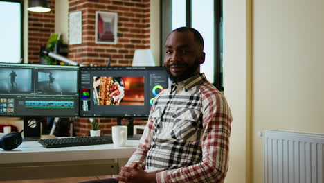 African-american-male-filmmaker-works-with-creative-editing-software