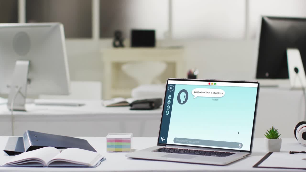 Empty modern office with computers and laptop with digital chat on screen