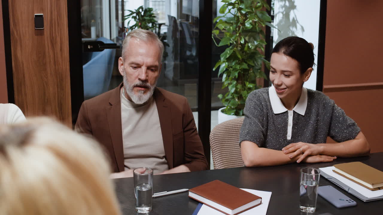 Diverse business professionals collaborating in a meeting