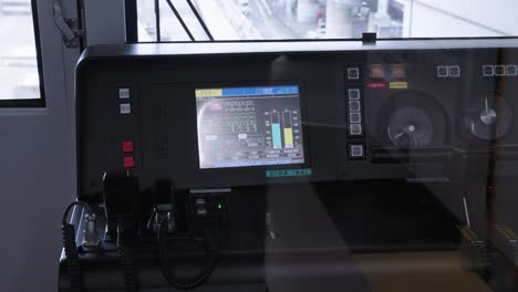 osaka monorail control console close up view of japanese public transport