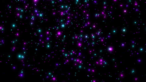 animación de manchas azules y púrpuras brillantes que caen sobre un fondo negro.