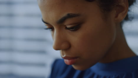 Serious business woman focusing on work. Closeup woman thoughtful face.