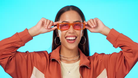 Woman,-face-and-sunglasses-for-fashion-in-studio