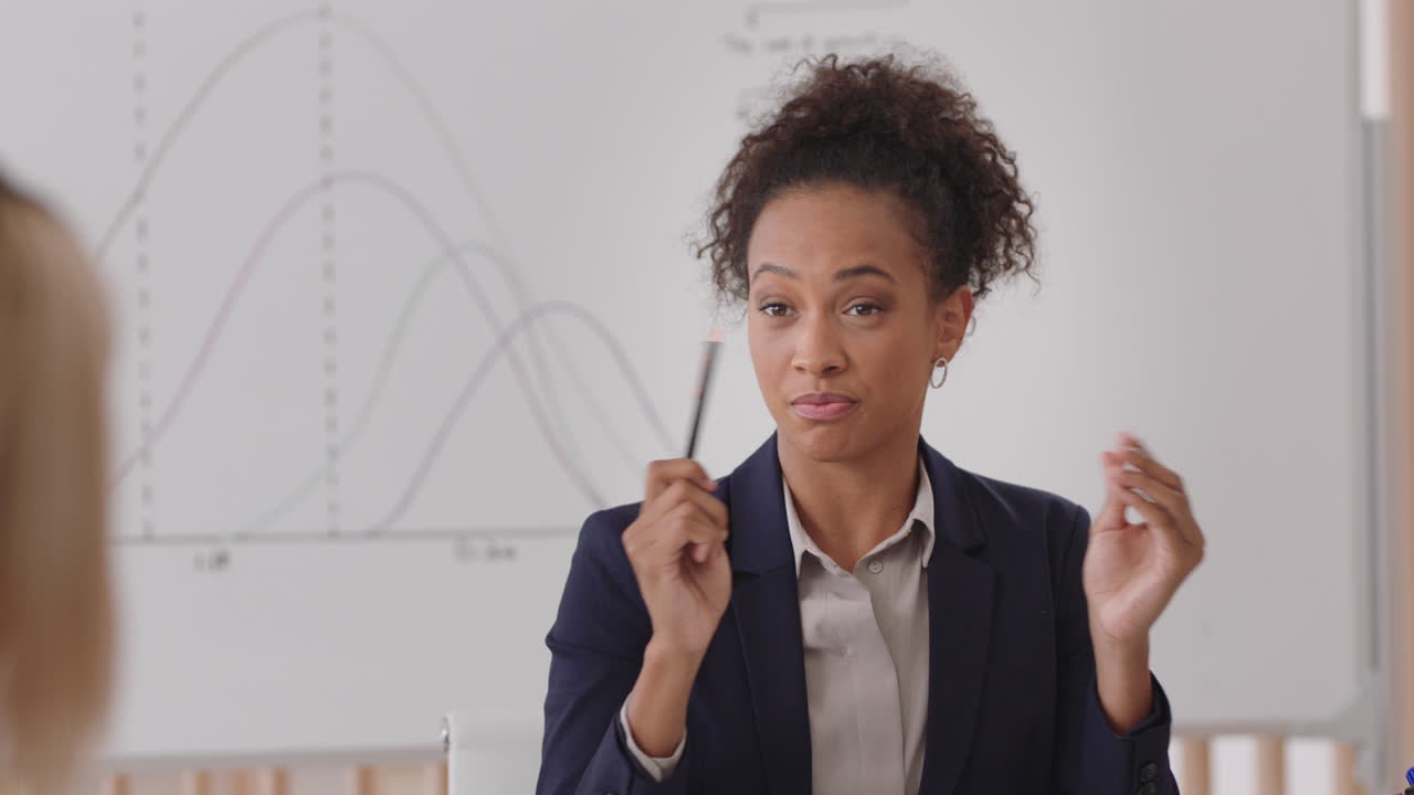 professional business woman team leader meeting with colleagues sharing creative ideas for startup project discussing corporate strategy in office boardroom