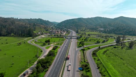 Aerial-view-dolly-in-of-Route-68-via-Santiago-Valparaiso,-Chile