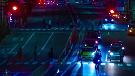 a night timelapse of the traffic jam at the downtown street in tokyo long shot