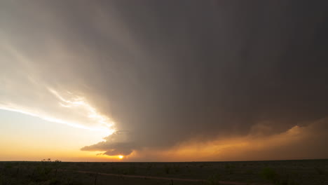 supercell dies and dries up as the sun sets in texas