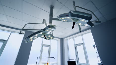 advanced illumination system in the surgical room. circle movement around the room with new equipment in modern hospital.