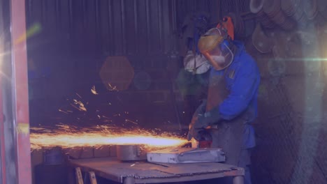 Animation-of-glowing-lights-over-biracial-man-in-workshop