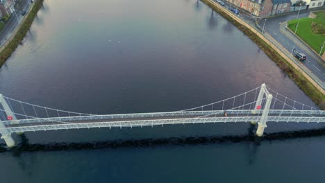 forwards fly over footbridge spanning ness river