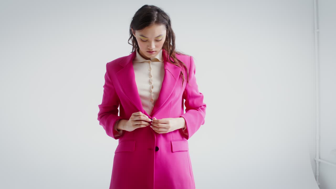 Woman in Pink Suit
