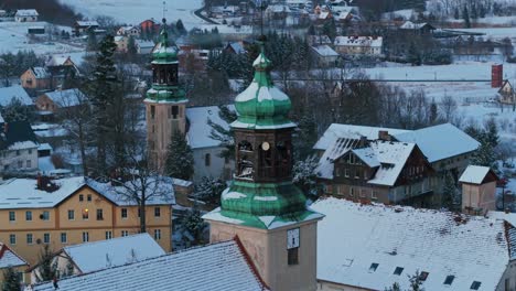 religious landmarks, picturesque sosnowka village, sunset scene, aerial