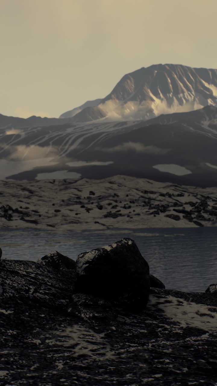 paisaje sereno de montaña con nieve y lago
