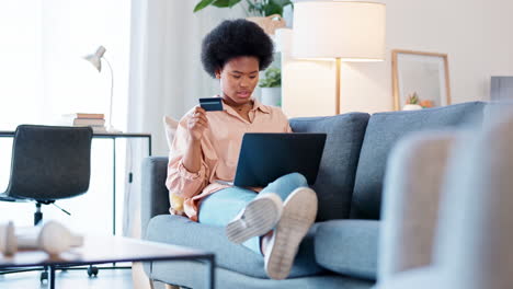 woman online shopping with a laptop