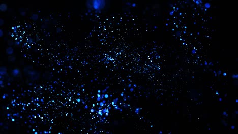 blue glowing particles circle in the air. abstract 4k background with particles