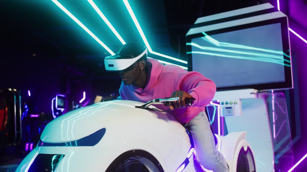 Man using VR simulator in arcade