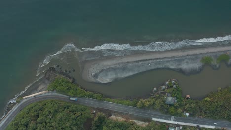 Aerial-View-Of-Coastal-Road-With-Beautiful-Beach-In-The-Province-Of-Tacloban-in-Leyte,-Philippines---top-down-shot