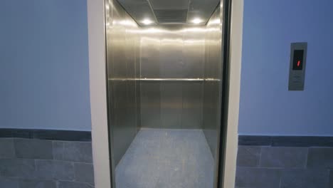 Shot of a lift door opening at hospital of Pakistan.