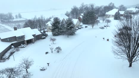 aerial flyover of snowy neighborhood