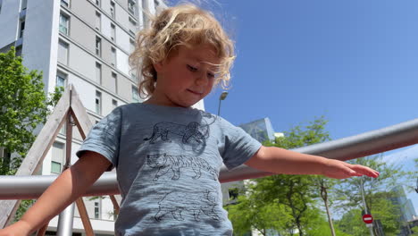 Small-girl-spinning-on-roundabout