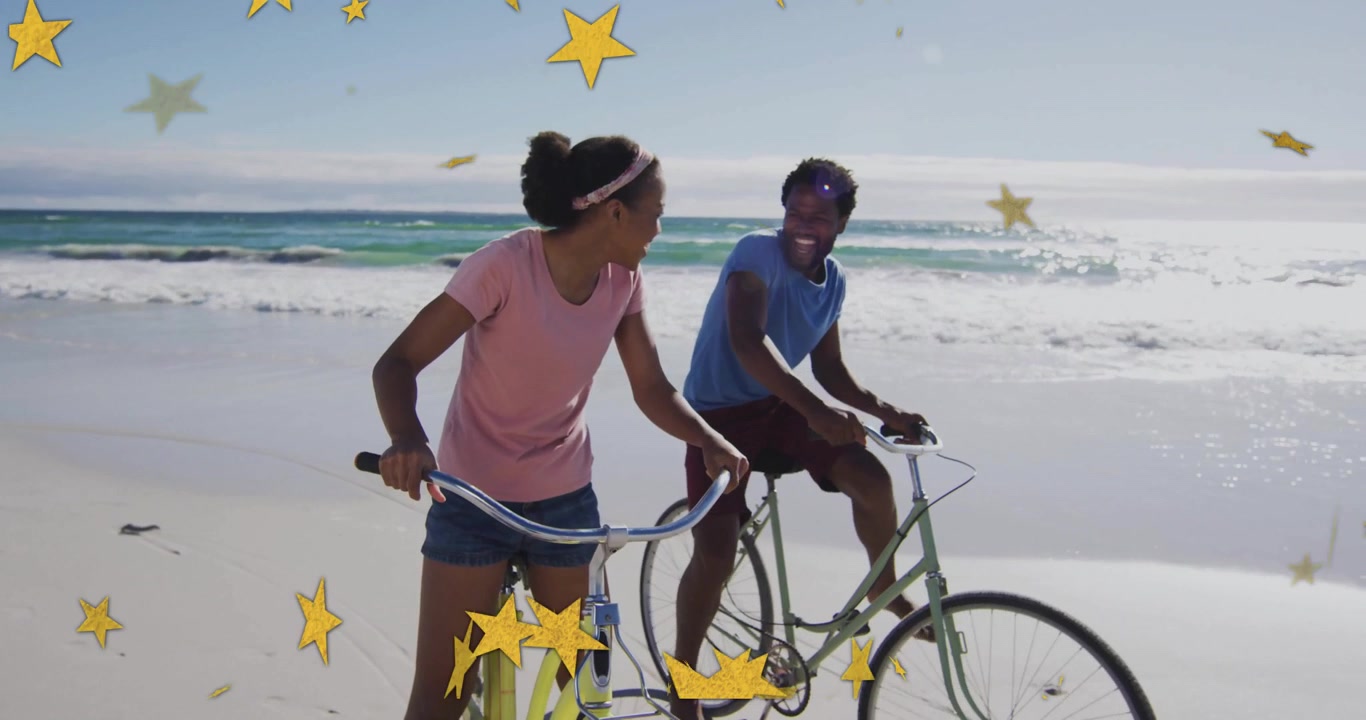 Couple cycling along sand activating drifting star shapes swirling around heads celebrating travel