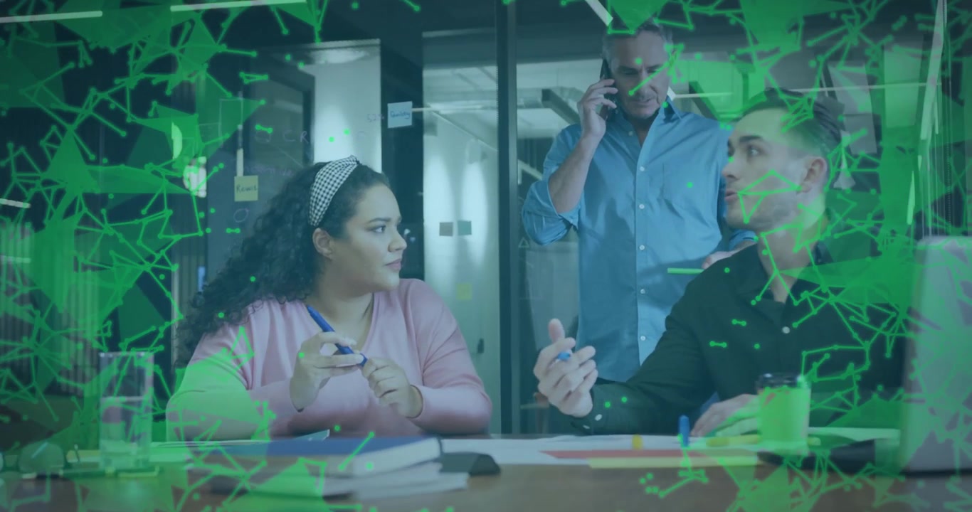 Colleagues marking documents sparking business planning with green data lines evolving