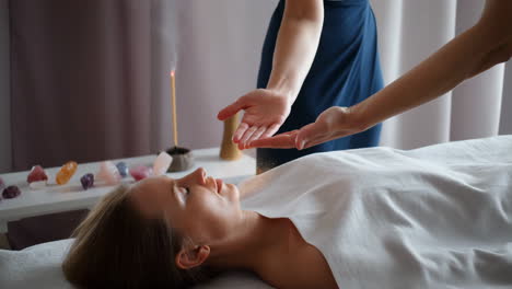 energy healing session with crystals and incense