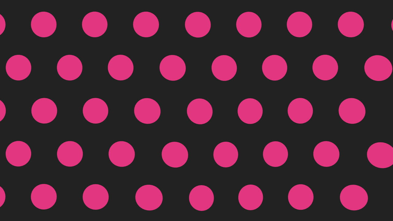 Pink and black polka dot pattern on a black background