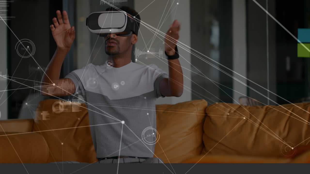 Man swiping his hands while wearing a virtual reality headset