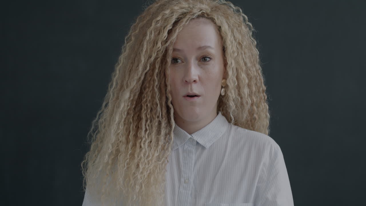 Woman with curly blonde hair, portrait photos