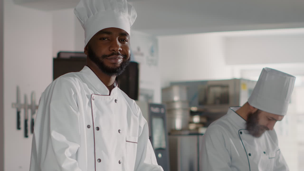 Portrait of african american cook preparing dish ingredients