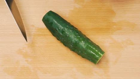 cutting a cucumber