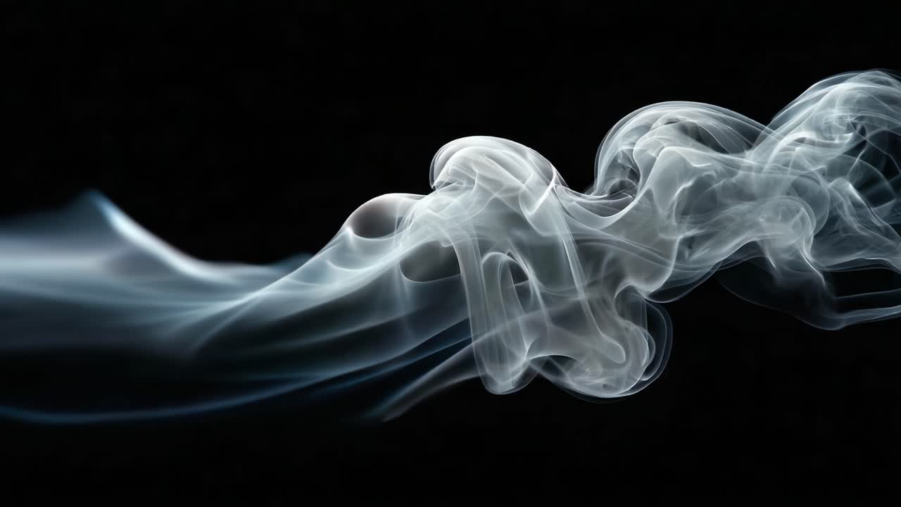 Captivating Swirls of Ethereal Smoke Flowing Gracefully Against a Dark Background, Creating Stunning Visual Patterns and Textures in Motion