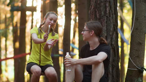 people talking in the woods