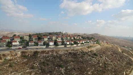 aerial view of a residential settlement built on a dry hillside