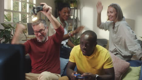 friends celebrating a video game victory