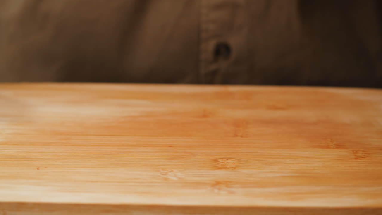 Raw Steak on Wooden Cutting Board