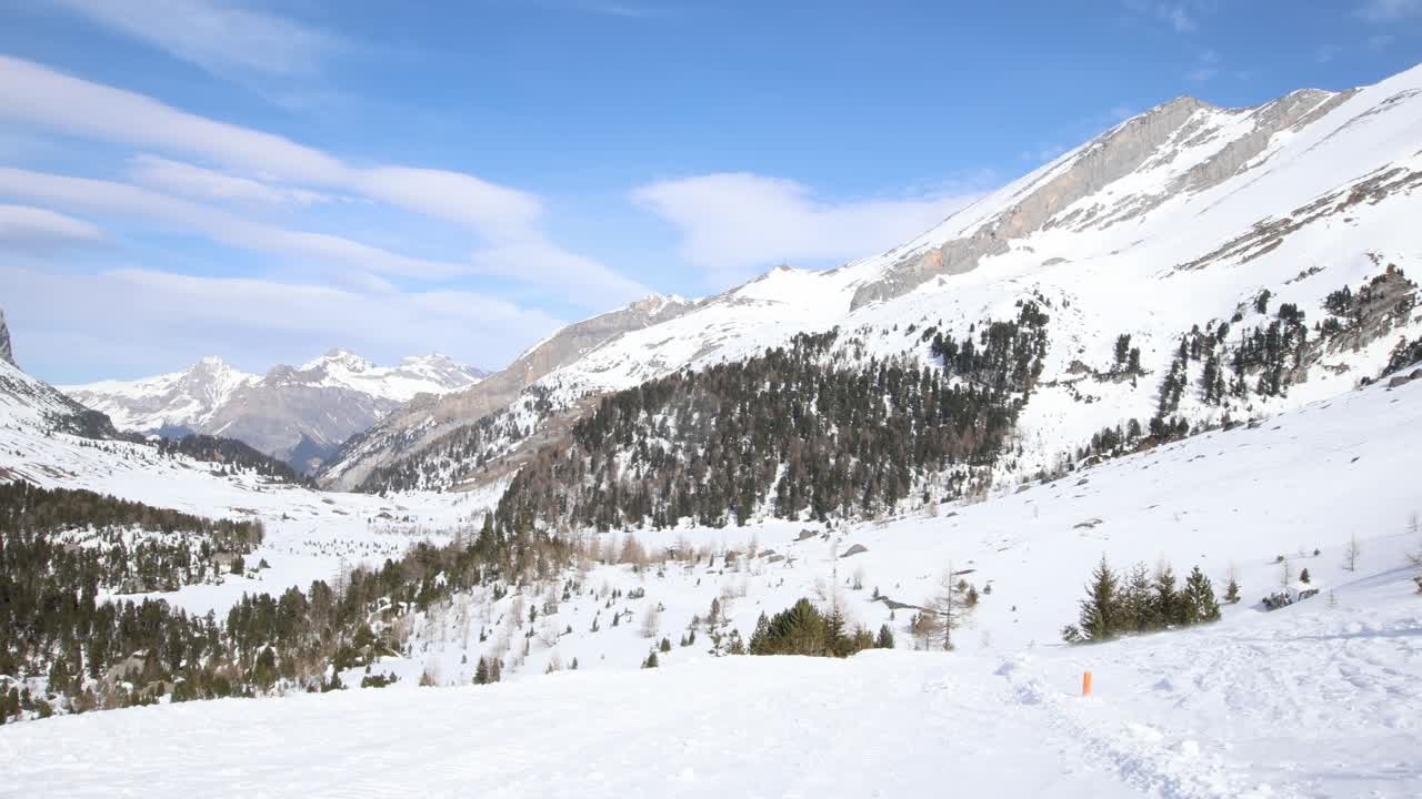 Winter mountain landscape with snow marker buried in the snow