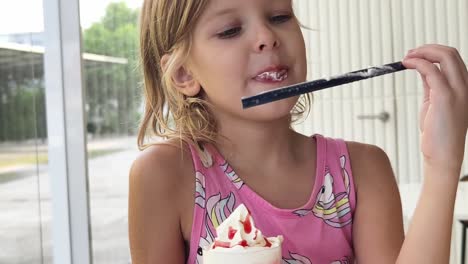 little girl eating ice cream