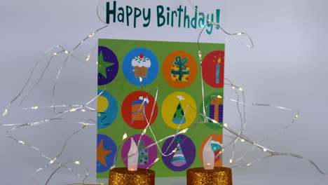 Happy-Birthday-greeting-card,-candle,-studio-illustration,-birthday-greetings,-party,-celebration,-anniversary-decoration,-congratulation-postcard,-lights