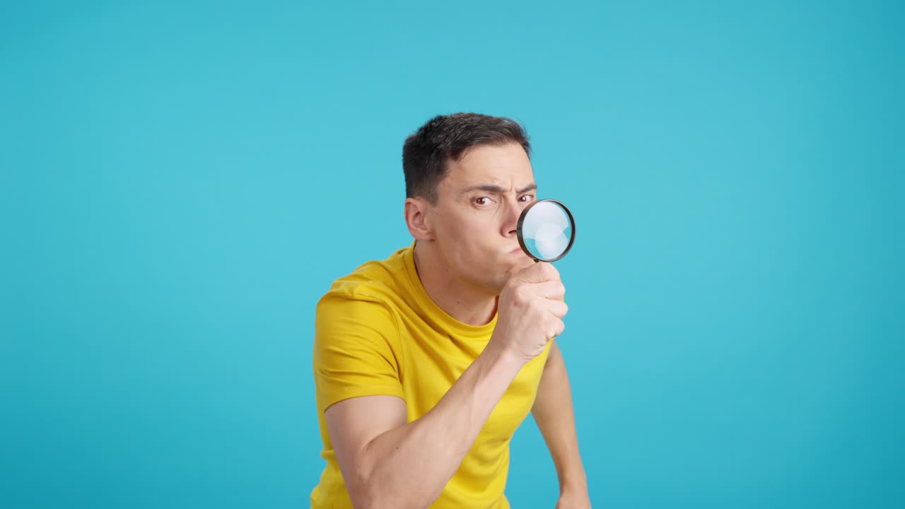 Man using a magnifying glass