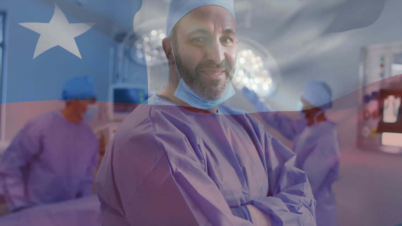 Animation of flag of chile over biracial male surgeon in hospital